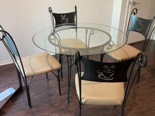 Glass dining table with 4 chairs – $50