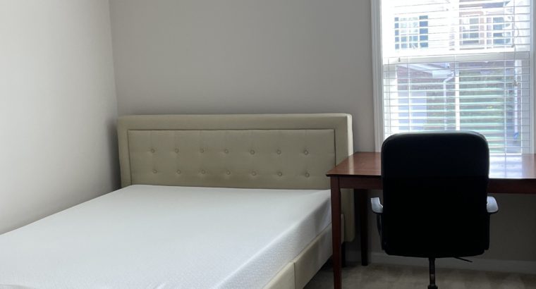 A fully furnished room available in townhome